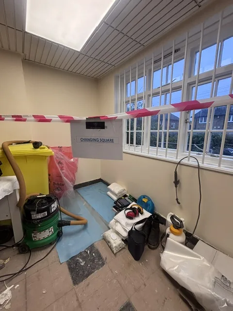 Asbestos floor tile and bitumen removal in Catford